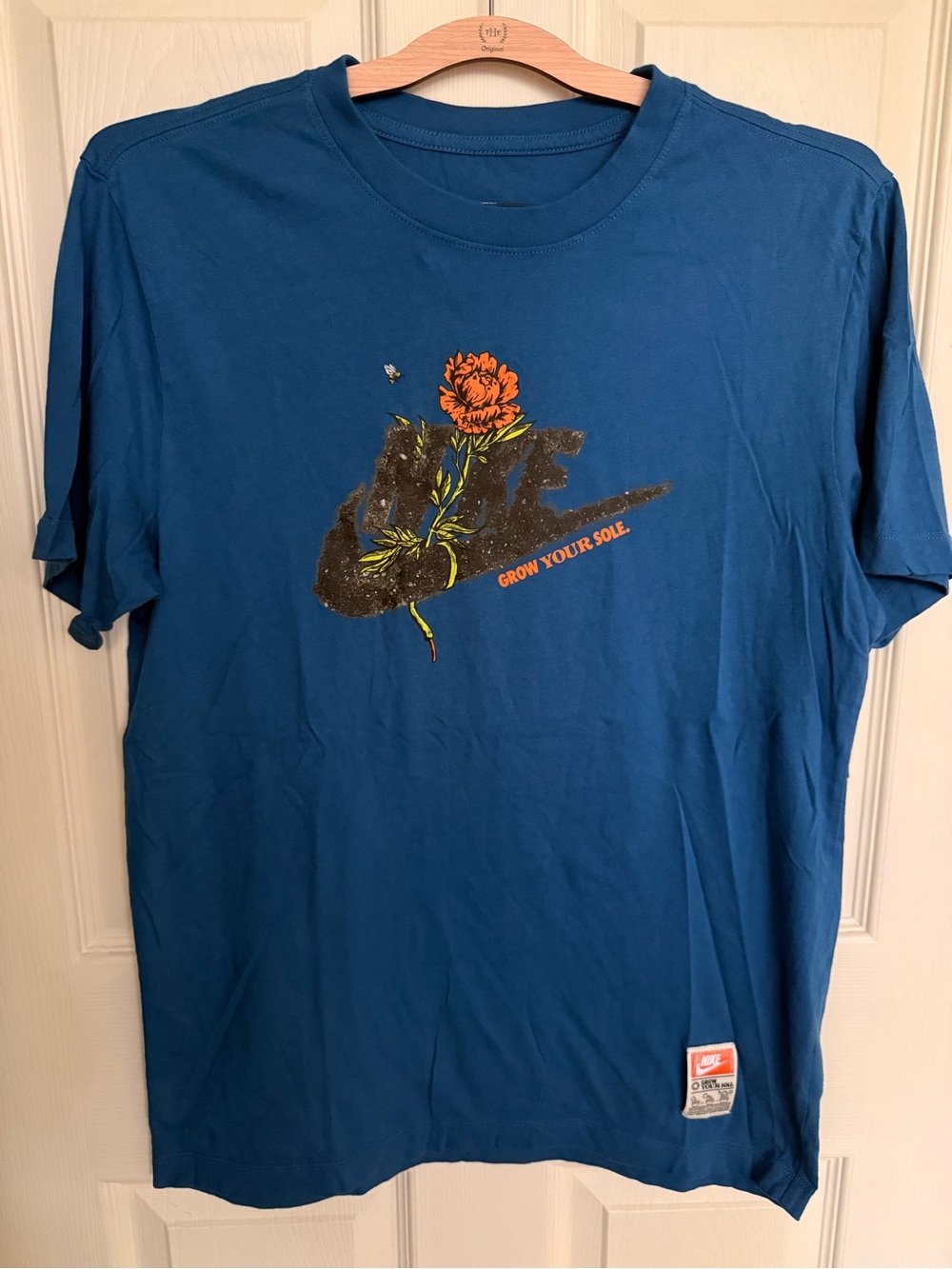 Nike Blue Graphic Crewneck T-Shirt with Floral Sneaker Print